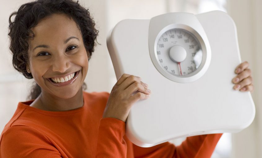 a woman getting over her weight loss plateau